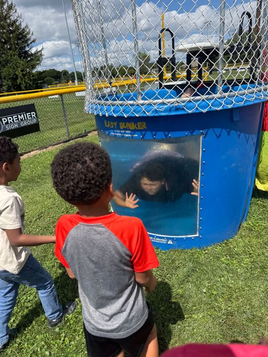 Kids at the dunk tank during OYO's Trunk or Treat